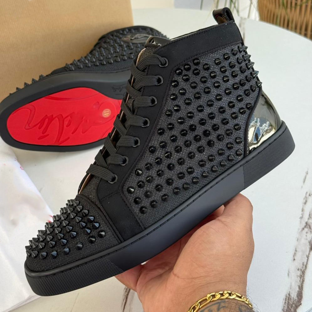 Calf leather and spikes high-top Sneakers