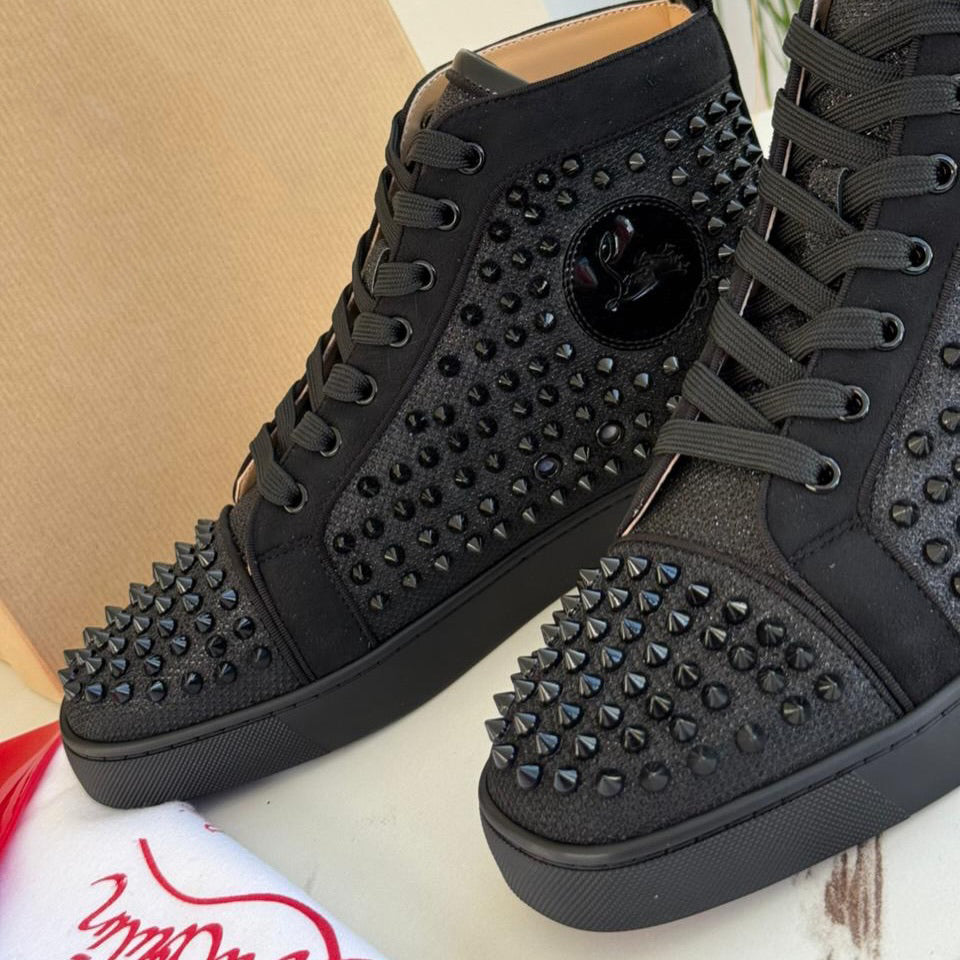 Calf leather and spikes high-top Sneakers