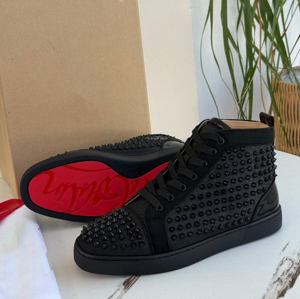 Calf leather and spikes high-top Sneakers